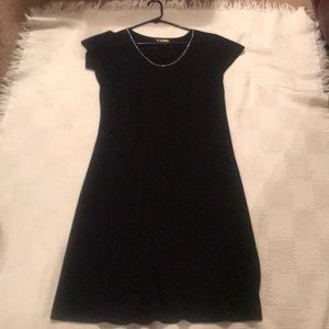 Knee length black dress with short sleeves